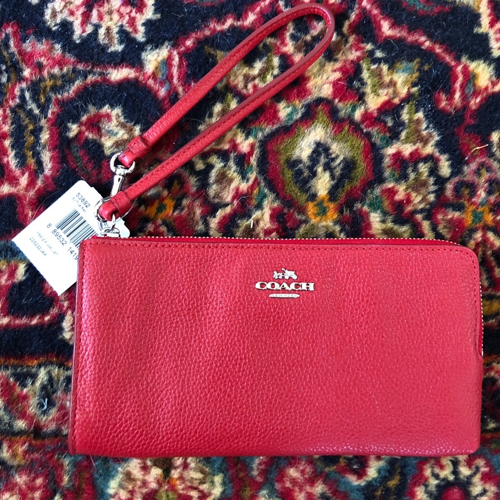 Coach textured red currant leather wristlet